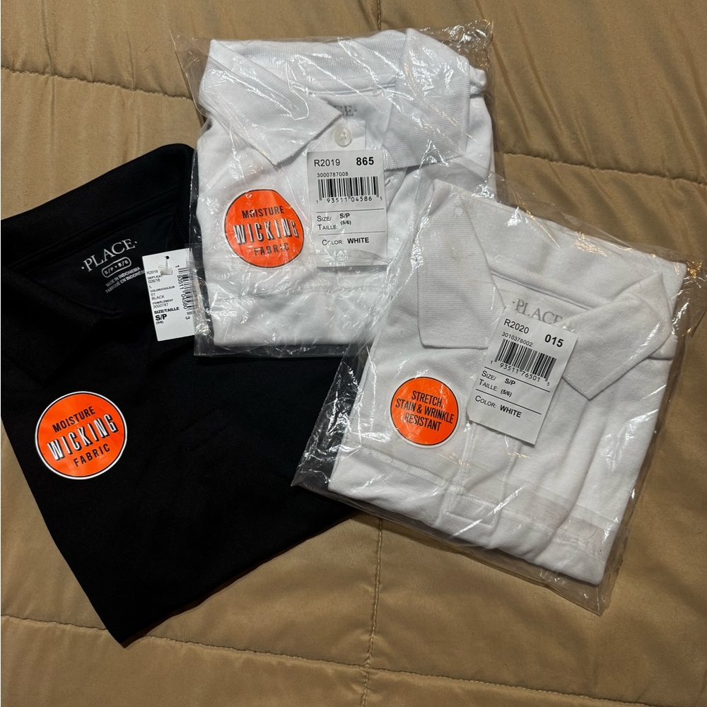 NWT white and black uniform tops